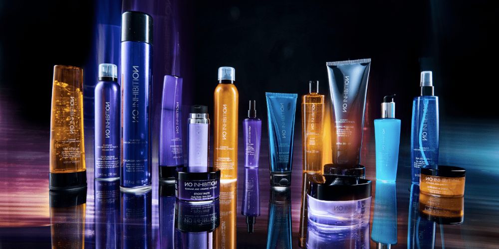 NO INHIBITION Professional color and haircare bottles of various sizes standing up- Lunica Beauty distributor for Arizona, Nevada, and Utah - Salon professionals